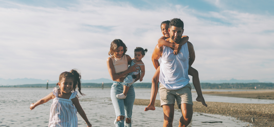family with young children on a beach